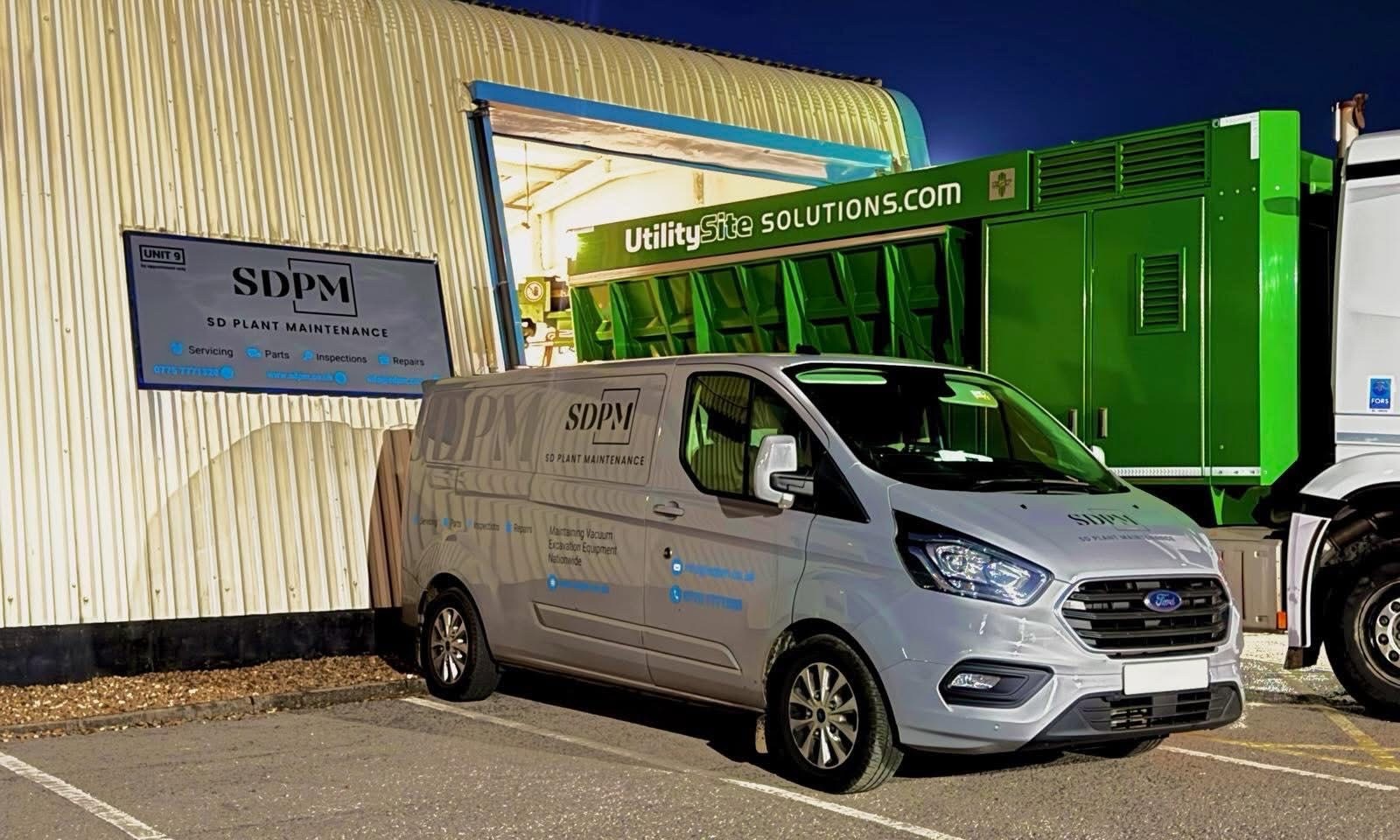 SDPM mobile vacuum excavator repair van outside new repair and maintenance workshop